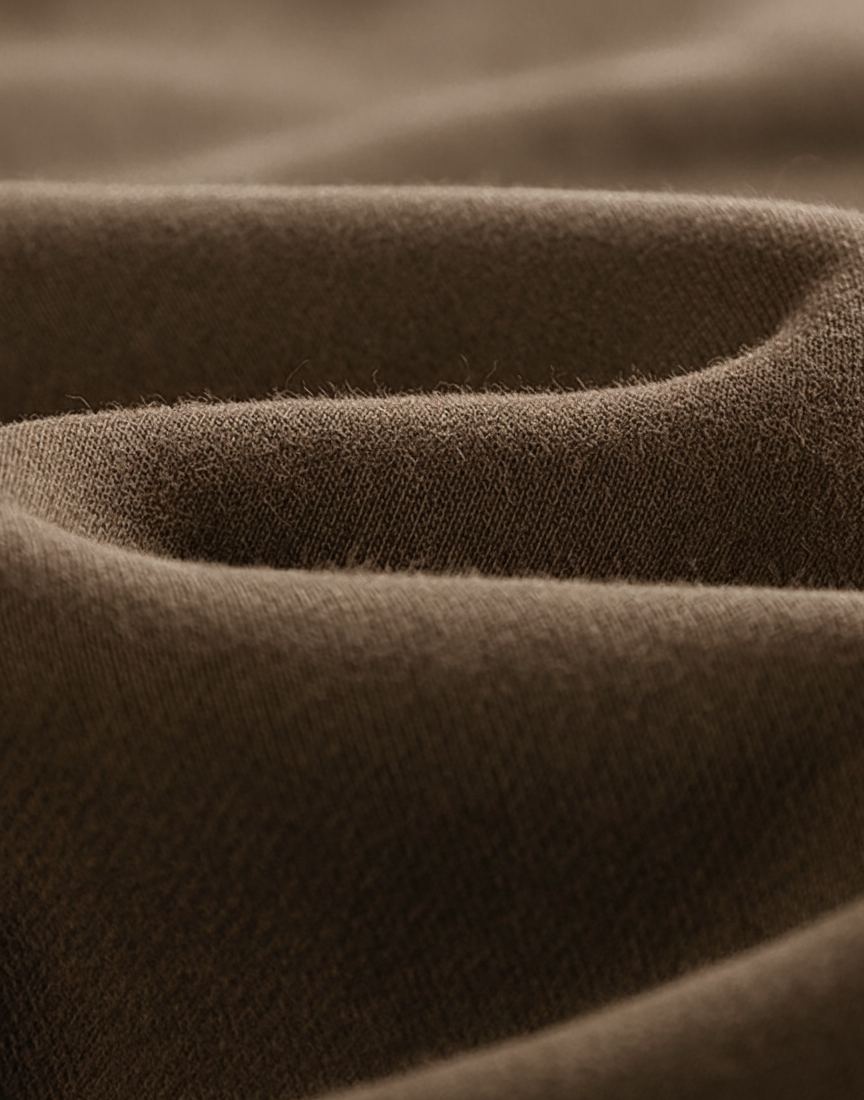 Close-up of brown fabric with a textured pattern