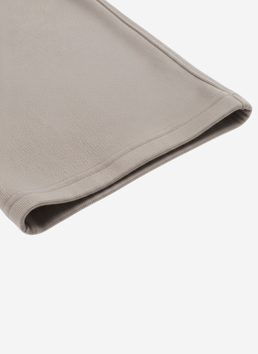Close-up of beige fabric on a white background