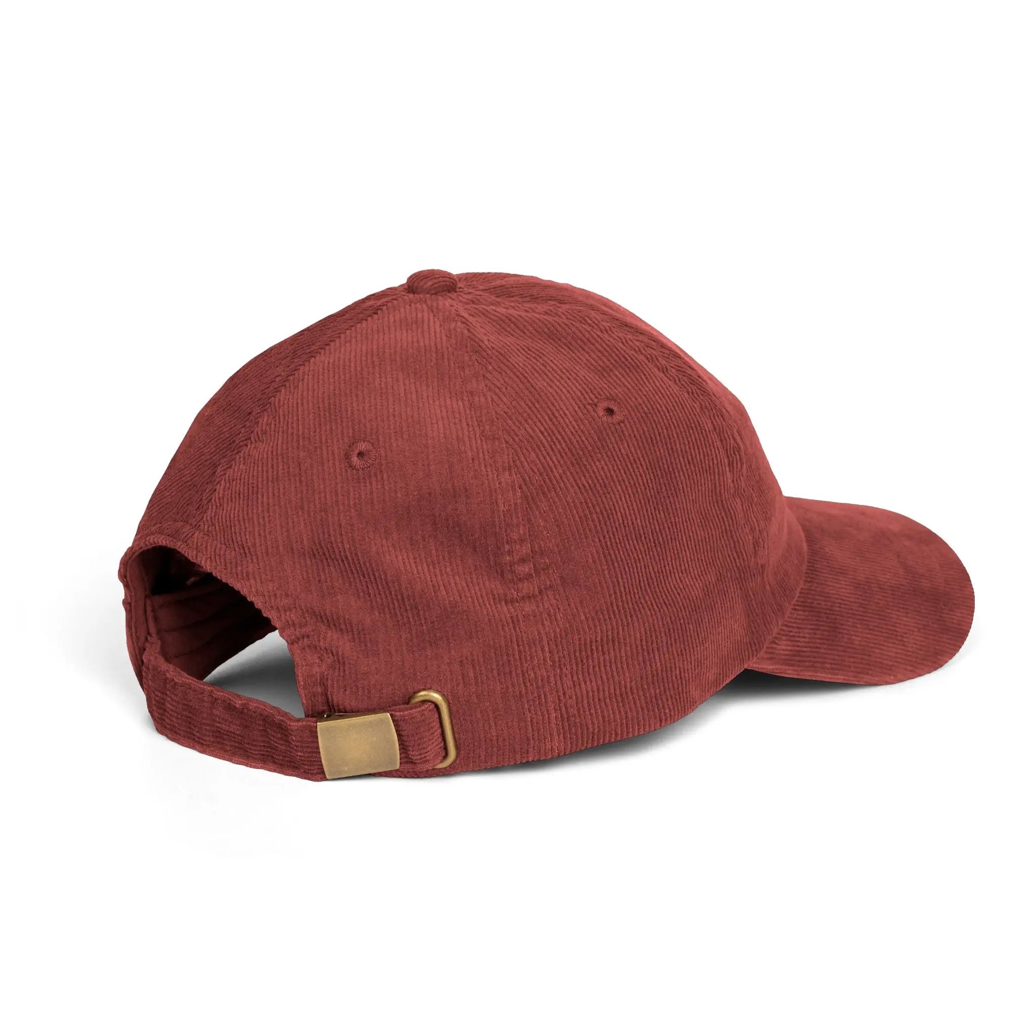 Red corduroy cap with a brown buckle on a white background