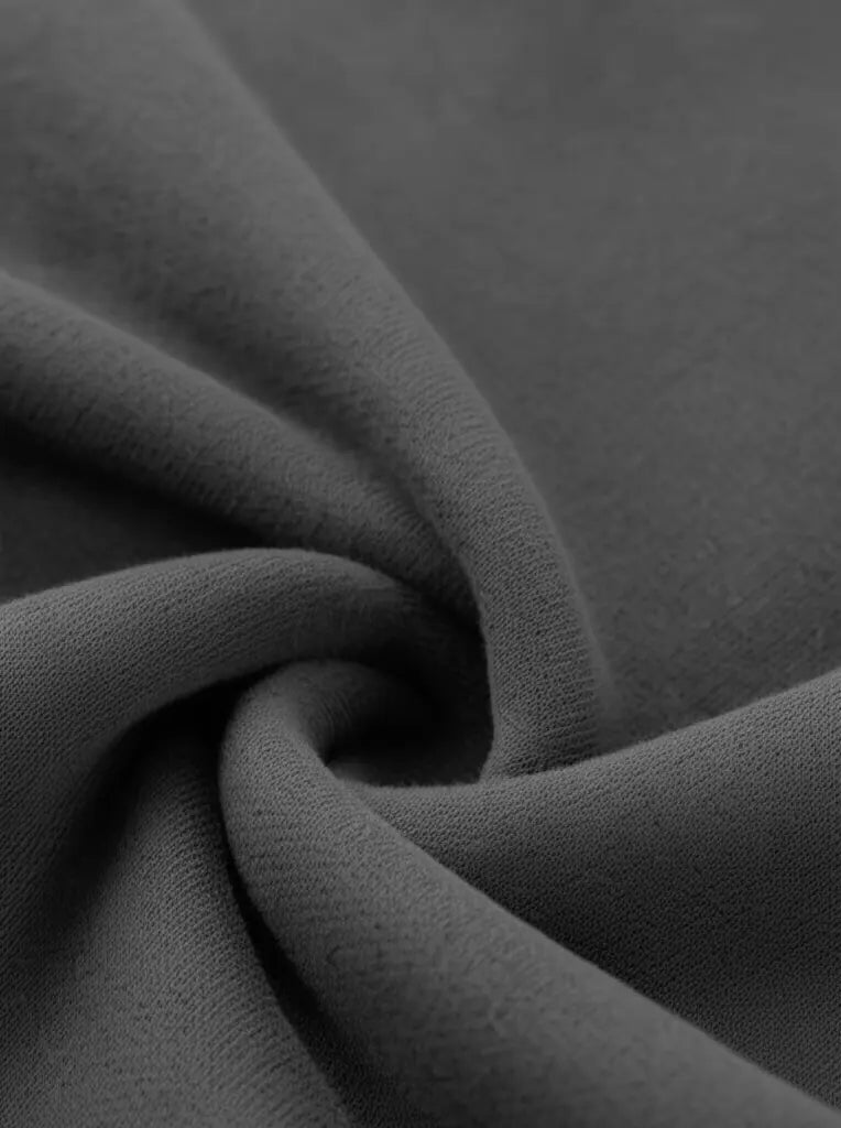 Close-up of dark gray fabric with a textured surface