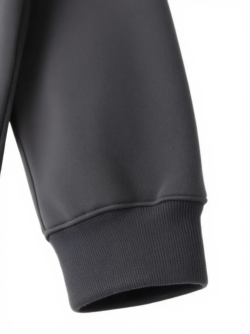 Close-up of a dark gray sweatshirt sleeve on a white background